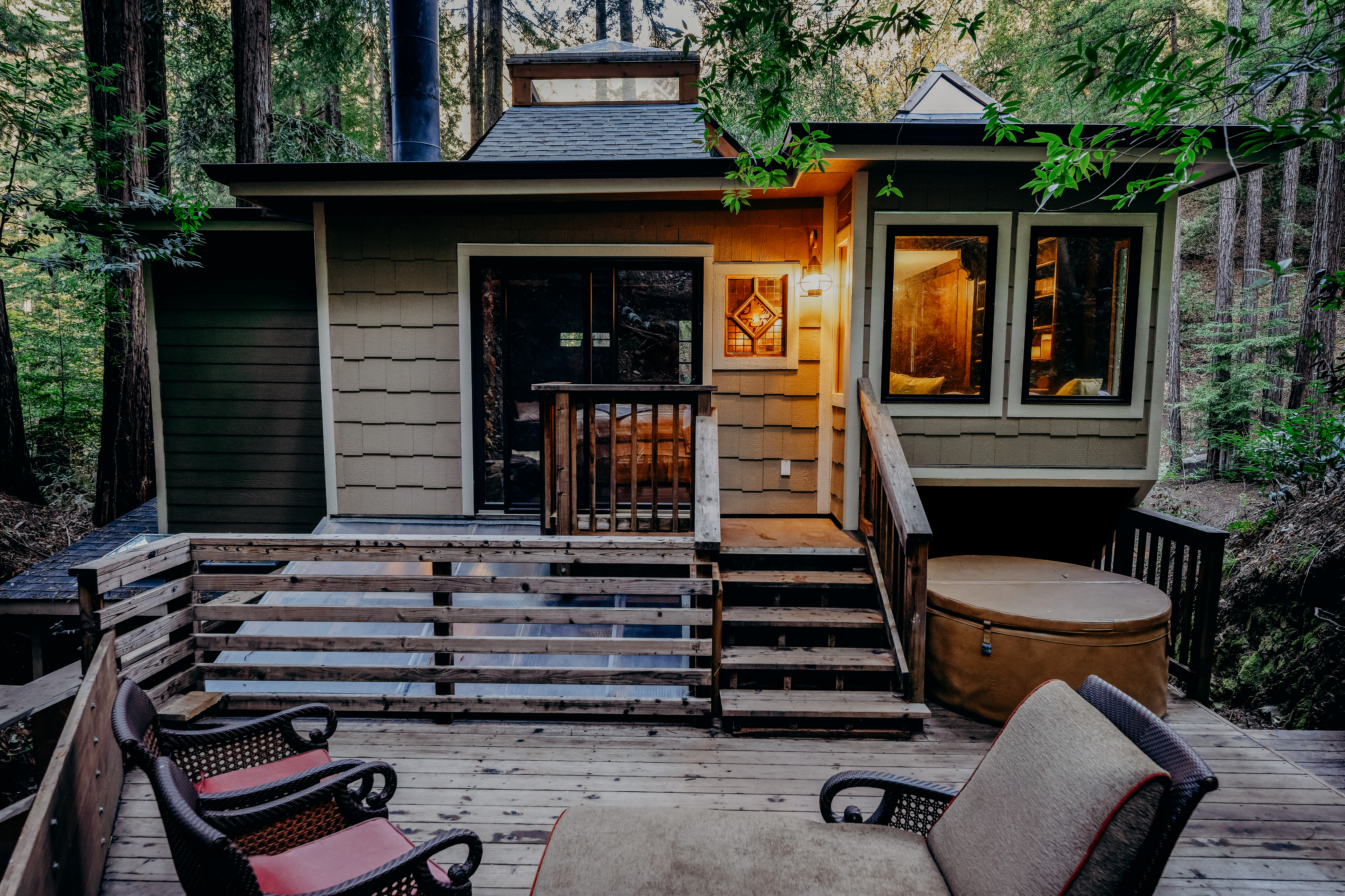 Image of home in woods with shakes and trim