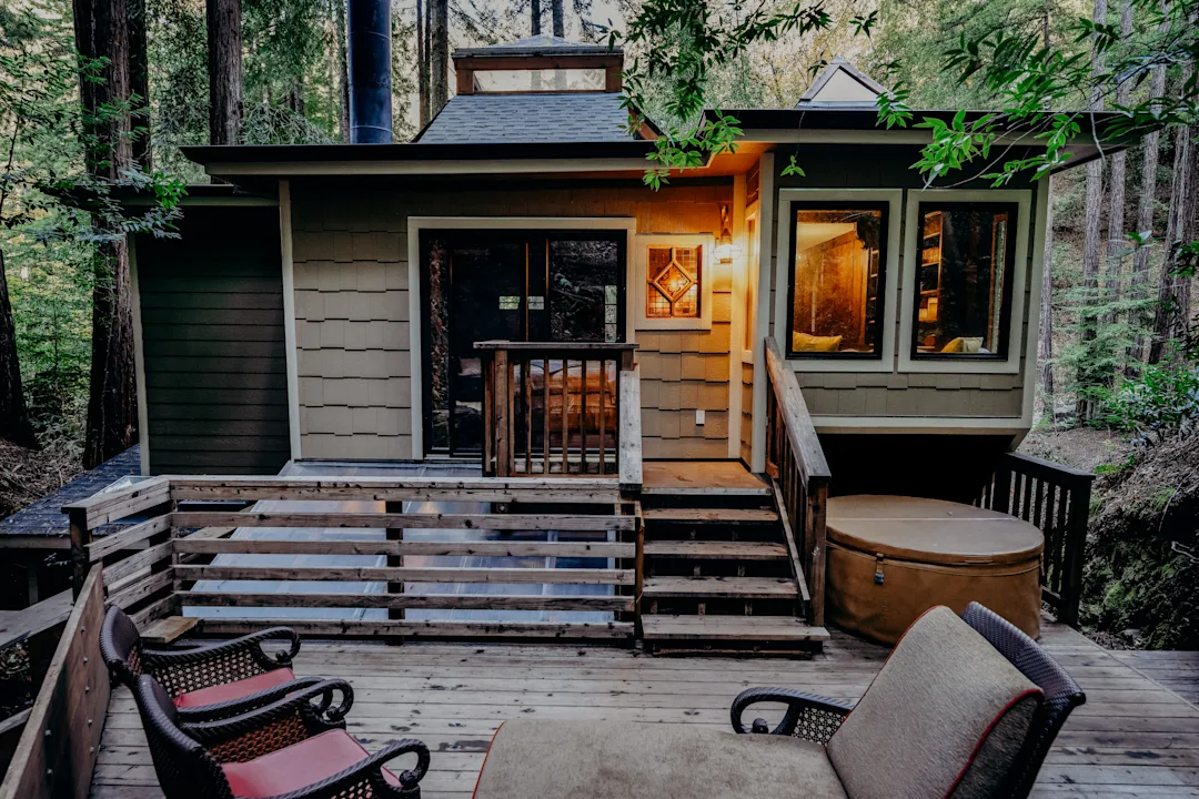 Image of home in woods with shakes and trim