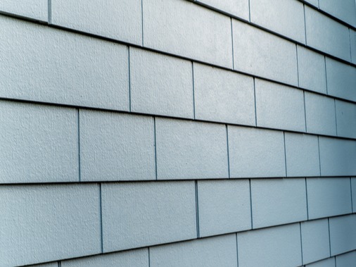 house with brick and black lap siding