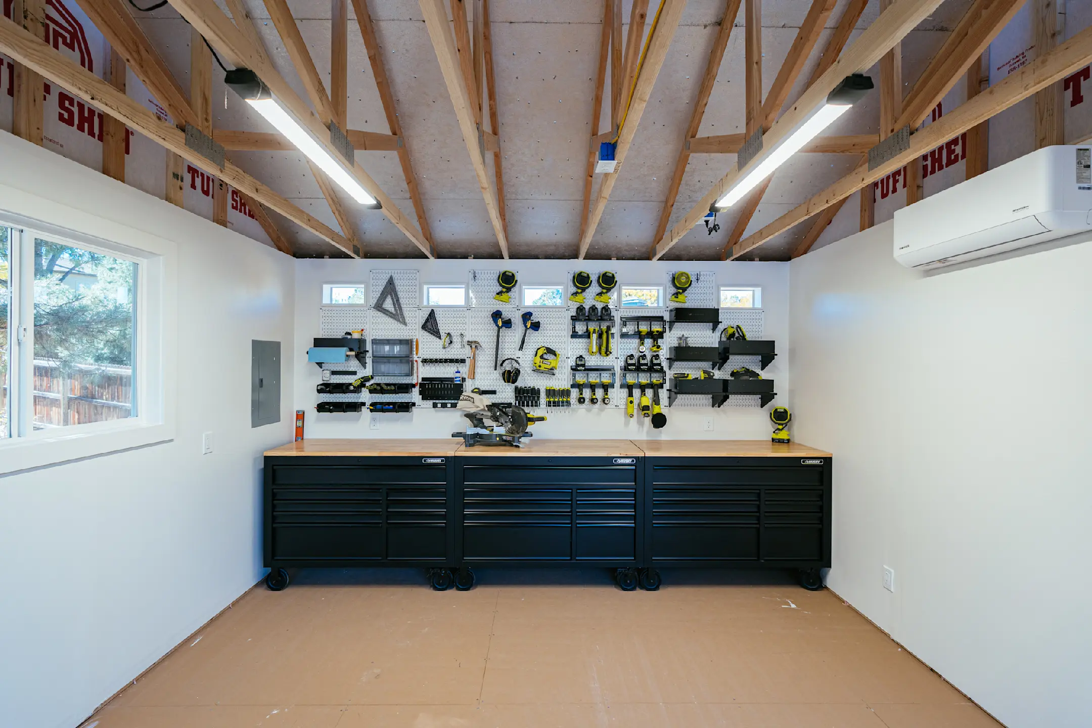 shed interior with tools and lp flooring