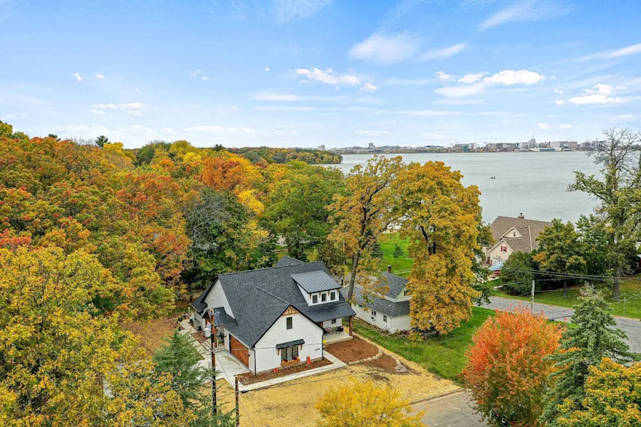 Zoomed out image of a house and trees around it
