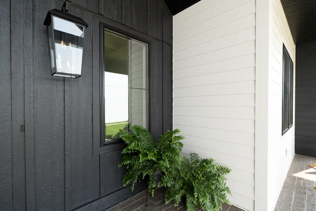 front porch of home with cedar texture siding