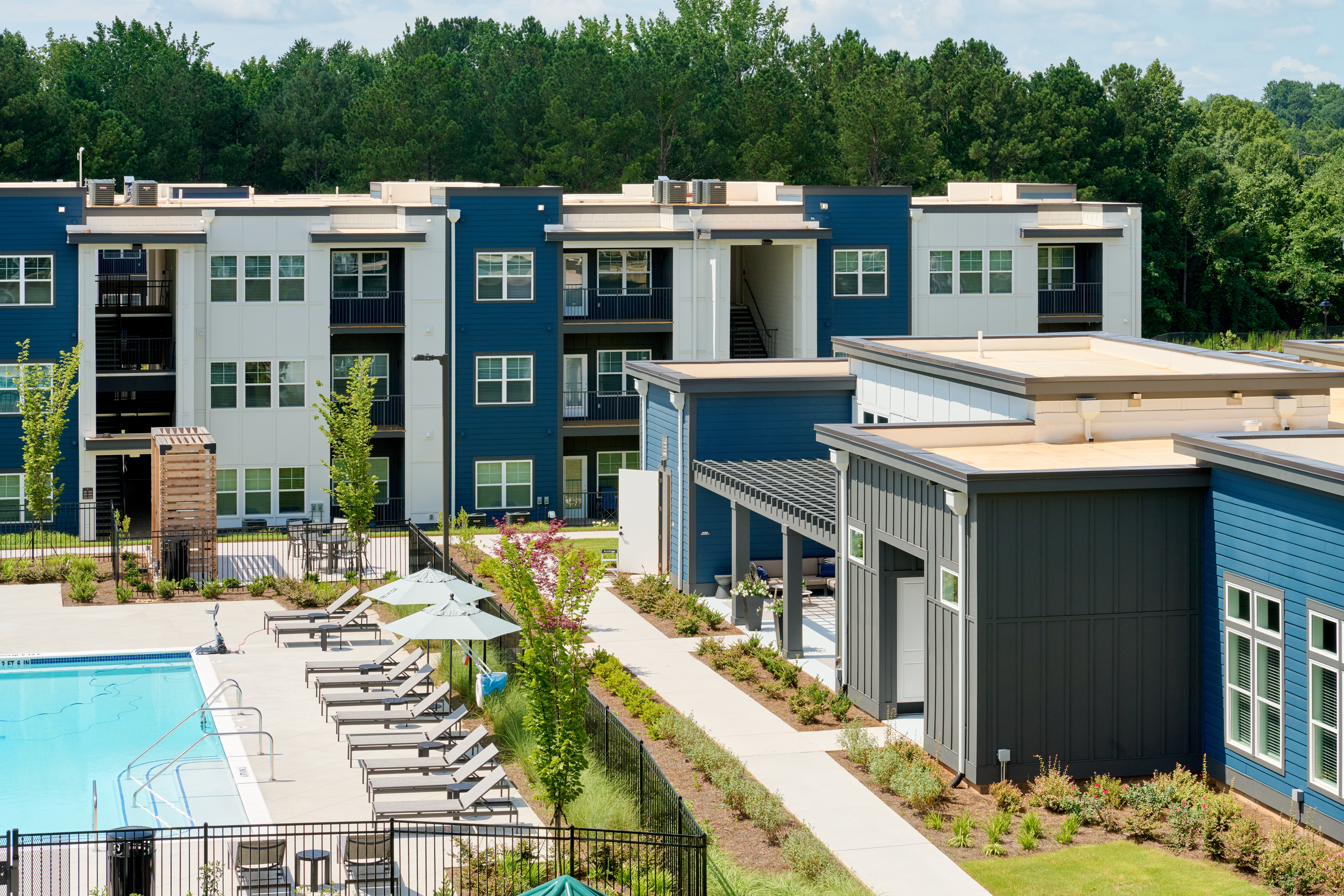 Image of Emblem Mill community building with pool showing