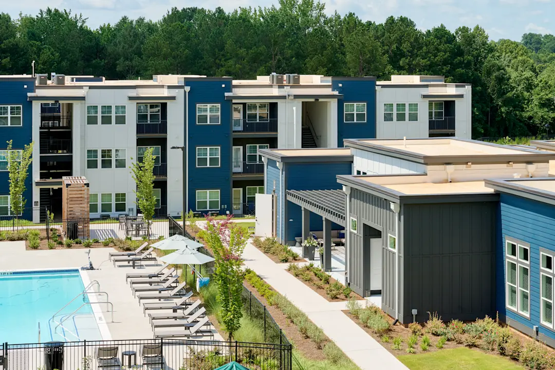 Image of Emblem Mill community building with pool showing