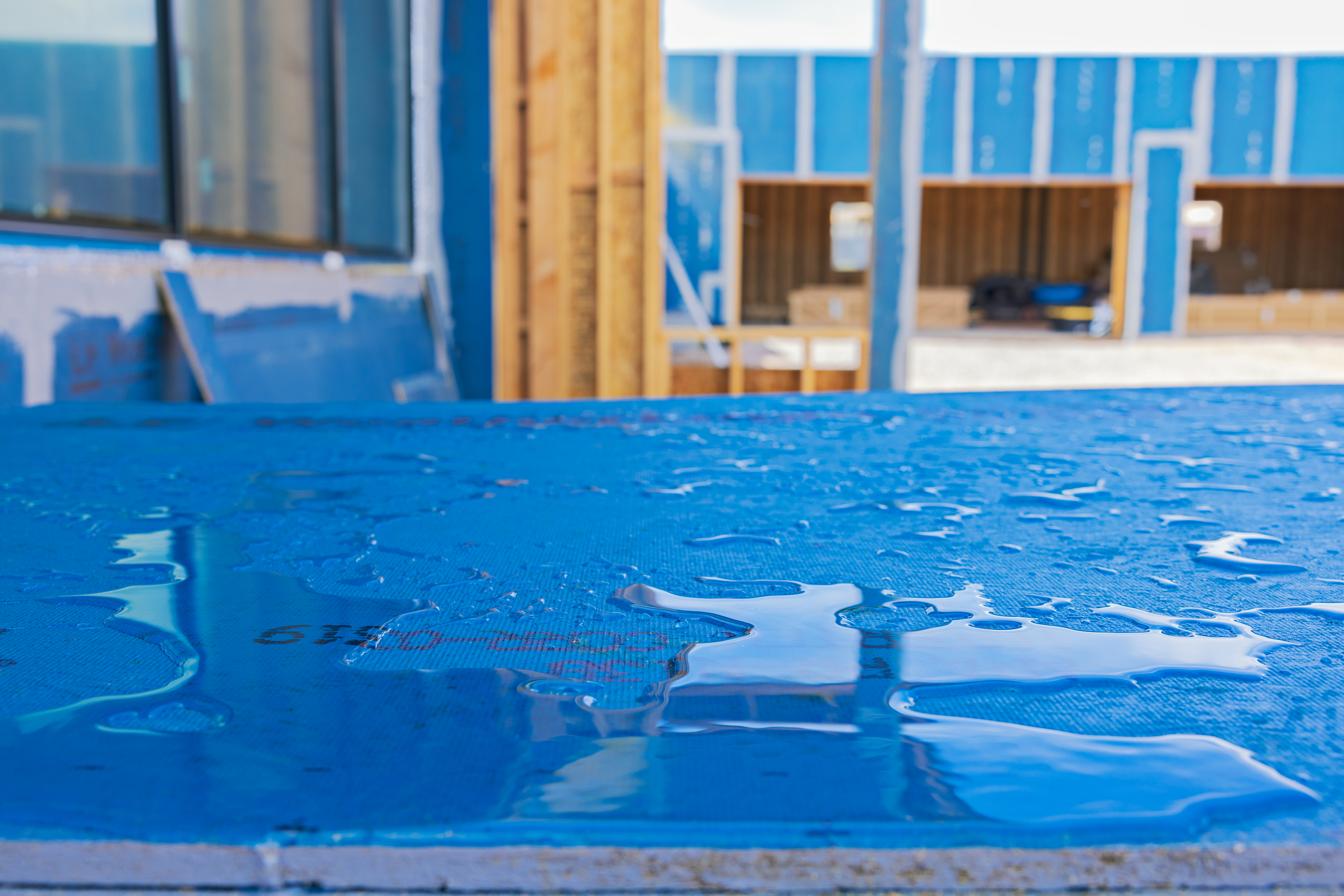 Close up of water dripping on a WeatherLogic panel