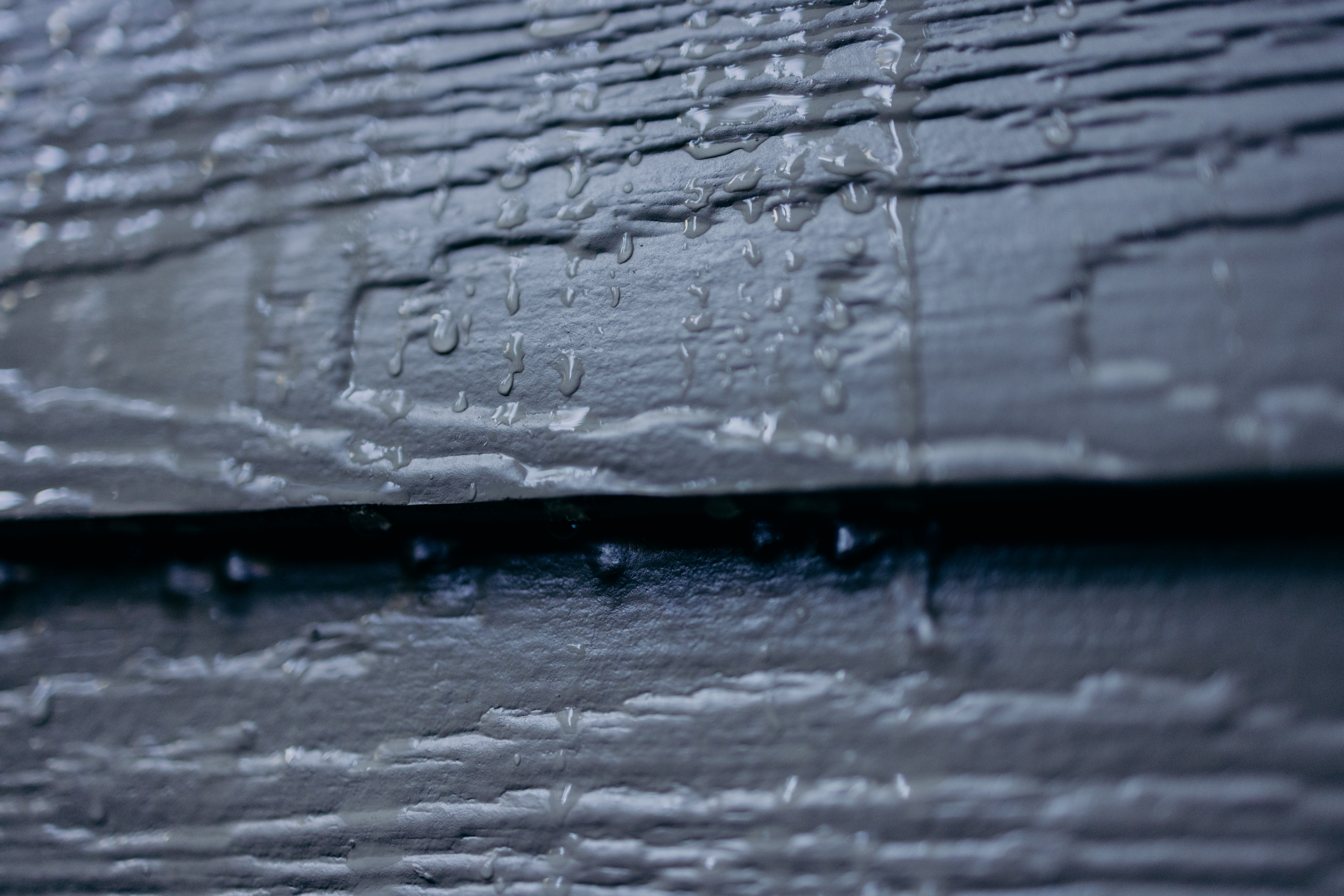 close up of moisture on siding