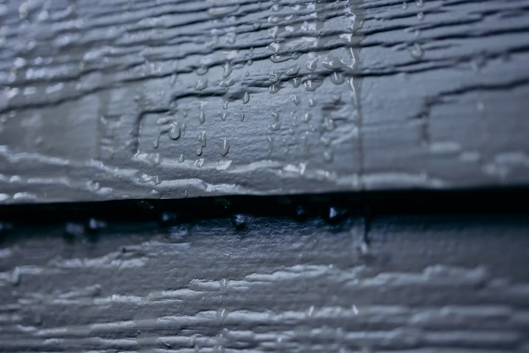 close up of moisture on siding
