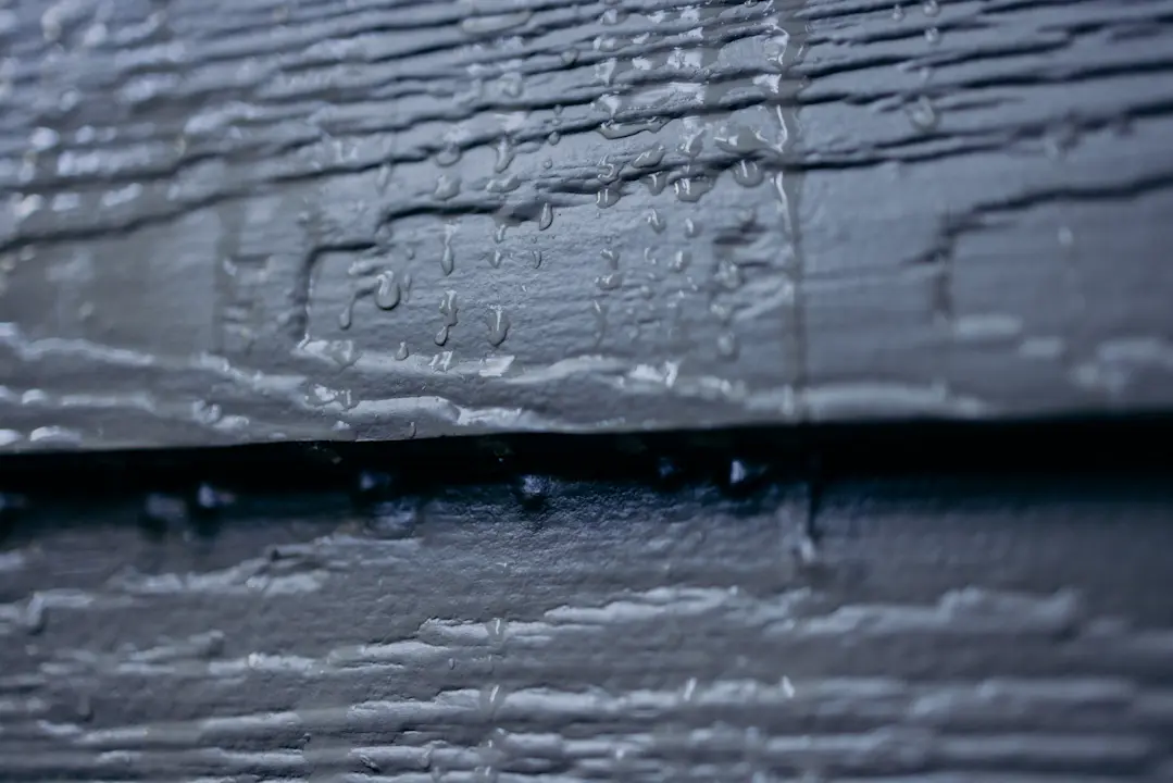close up of moisture on siding