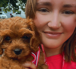 Qualified SQP in veterinary medicines advice, Ellie and her dog, Albert smiling for a picture