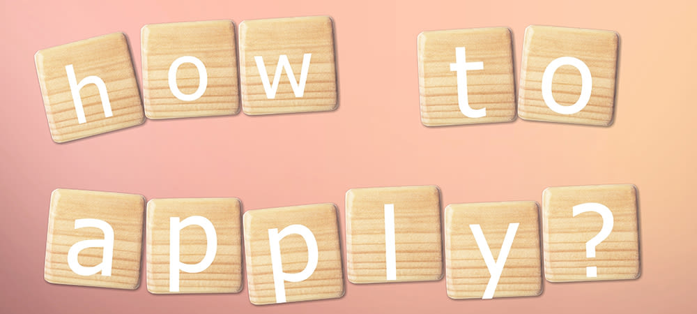 how to apply written on wooden tiles on a pink gradient background