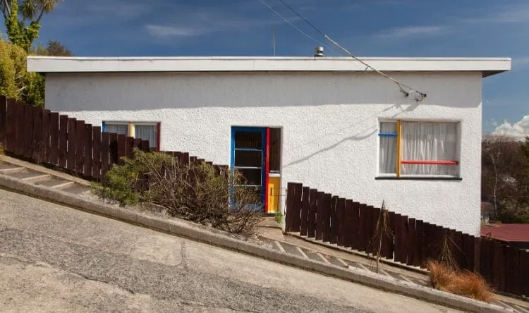 A house on a road uphill in the city of Dunedin