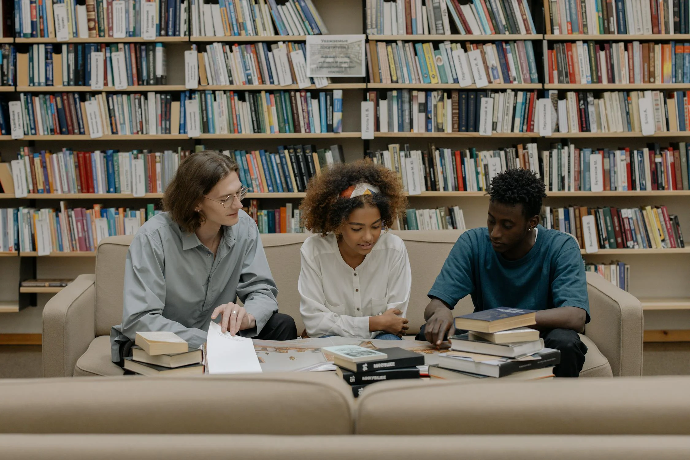 international students reading in a library