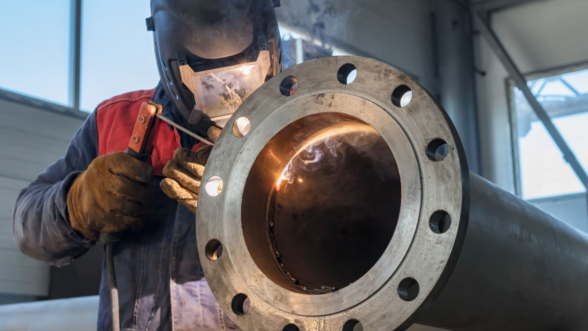 A man welding metal