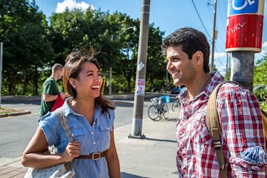 Students laughing road side