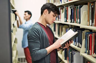 student reading in library