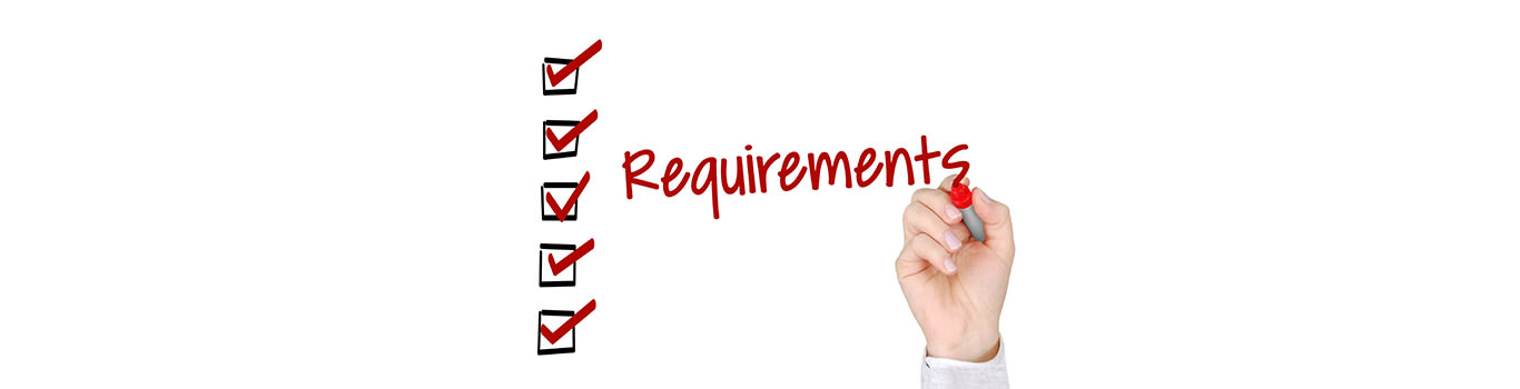 Requirements written on a white board in red with a check list