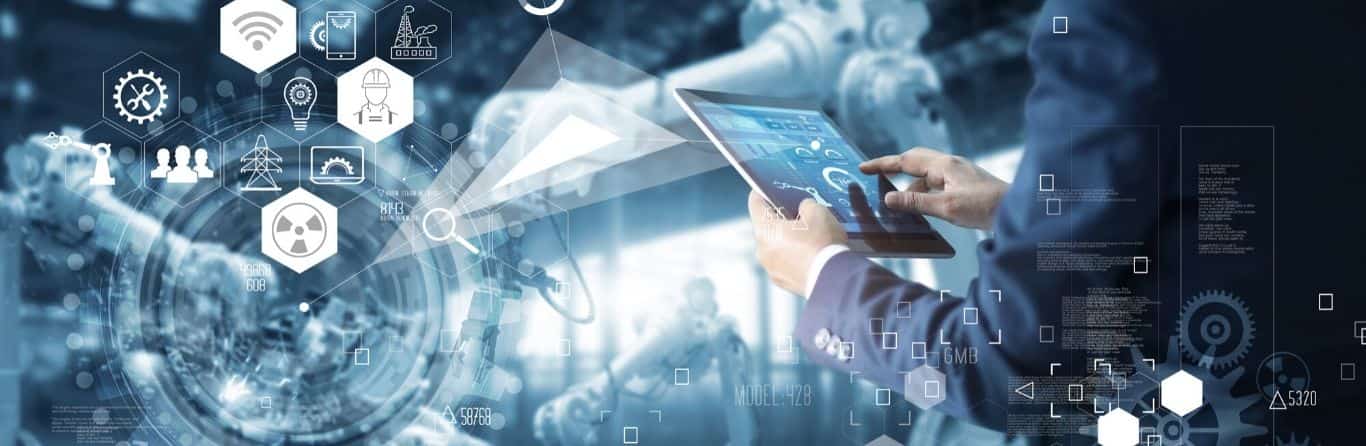 An IT employee is using the digital device