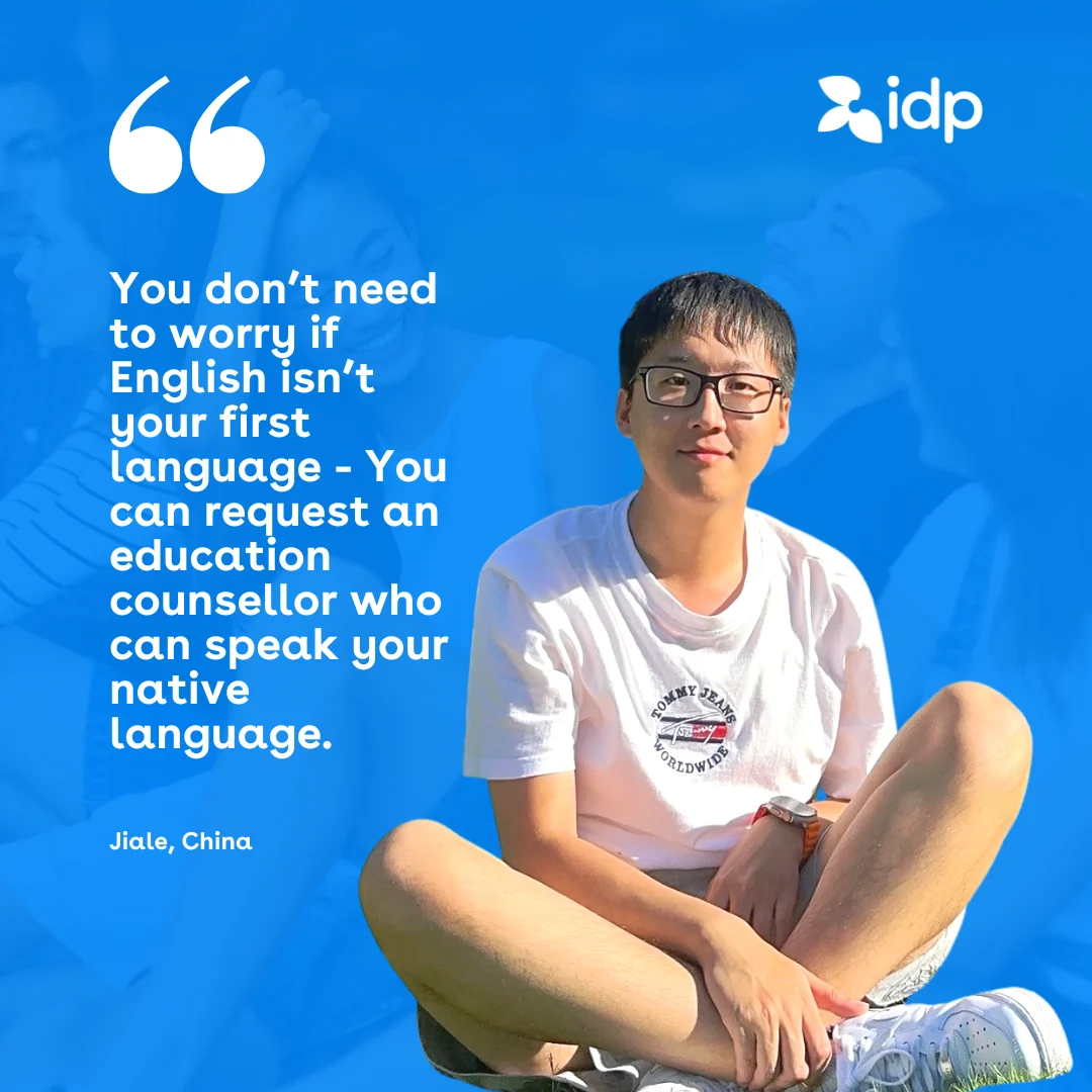 A young person sits cross-legged, smiling, on a blue background with the idp logo. A quote says non-native English speakers can request an education counsellor who speaks their language. Attributed to Jiale, China.