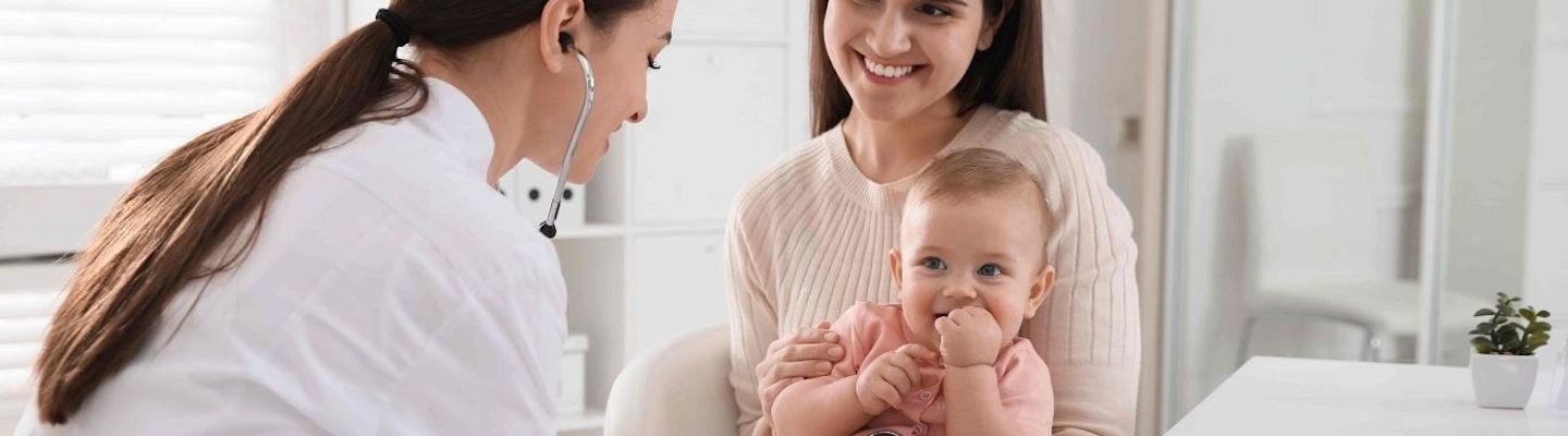 A Paediatrics doctor with a baby