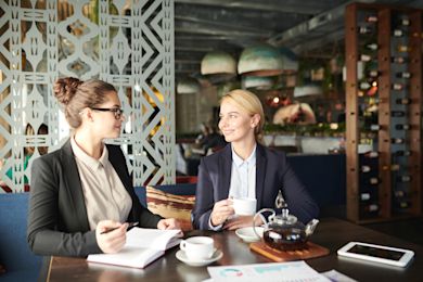 Two women talking in Cafe