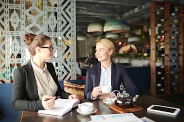 Two women talking in Cafe