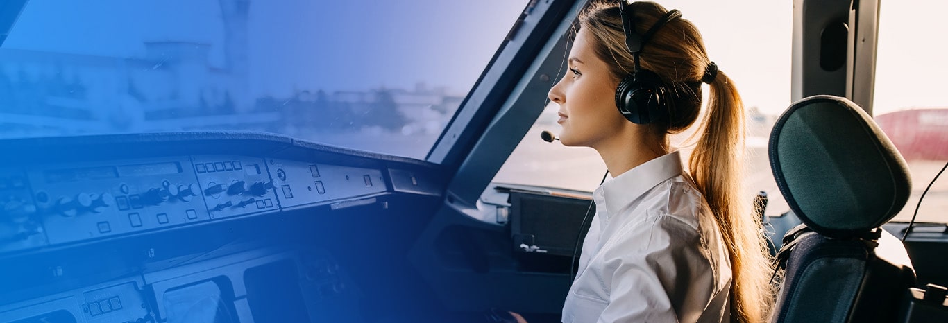 A lady pilot is controlling the airplane