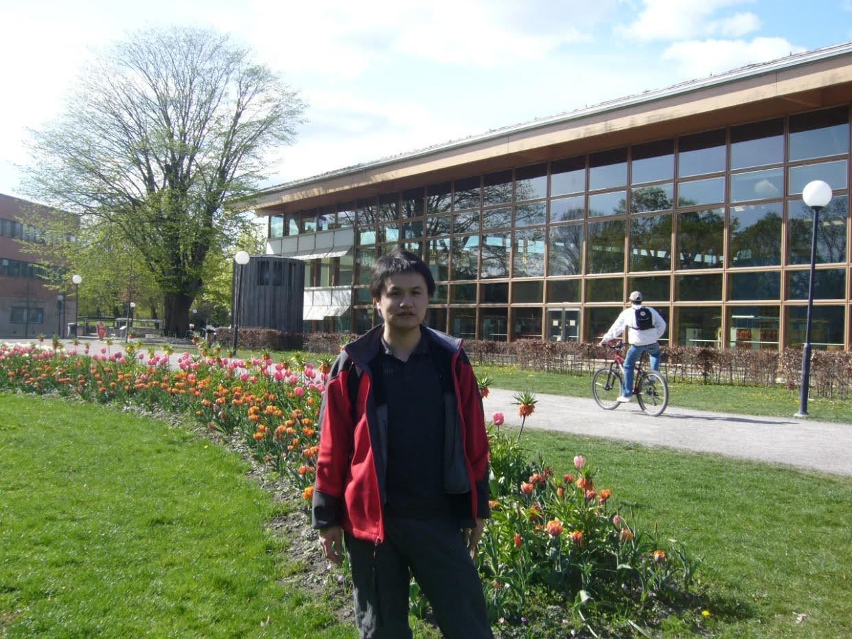 Alex Liang, in Sweden wearing a red jacket