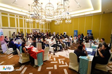 Aspiring international students listening attentively to the seminar part of the caravan