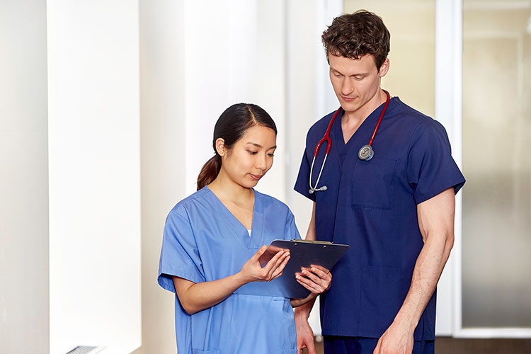 two nurses talking