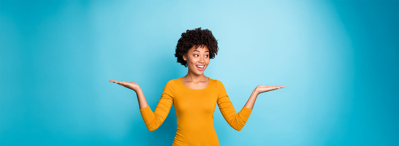 Close-up portrait of her she nice  cheerful cheery wavy-haired girl holding on two palms choose choice isolated over bright vivid shine vibrant blue coloUr background