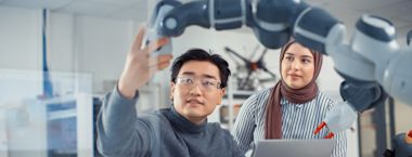 A male student working in a computer