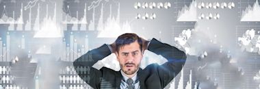 A man wearing a suite and tie looking confused