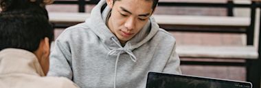 Two students studying together in New Zealand