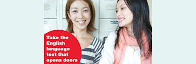 Two people smiling against a bank of lockers, with a red partial circle with the words Take the English language test that opens doors.