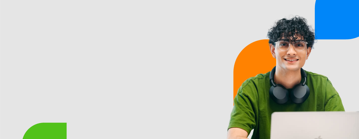 A person seated against a light grey background, with colorful abstract shapes in green, orange, and blue accenting the scene