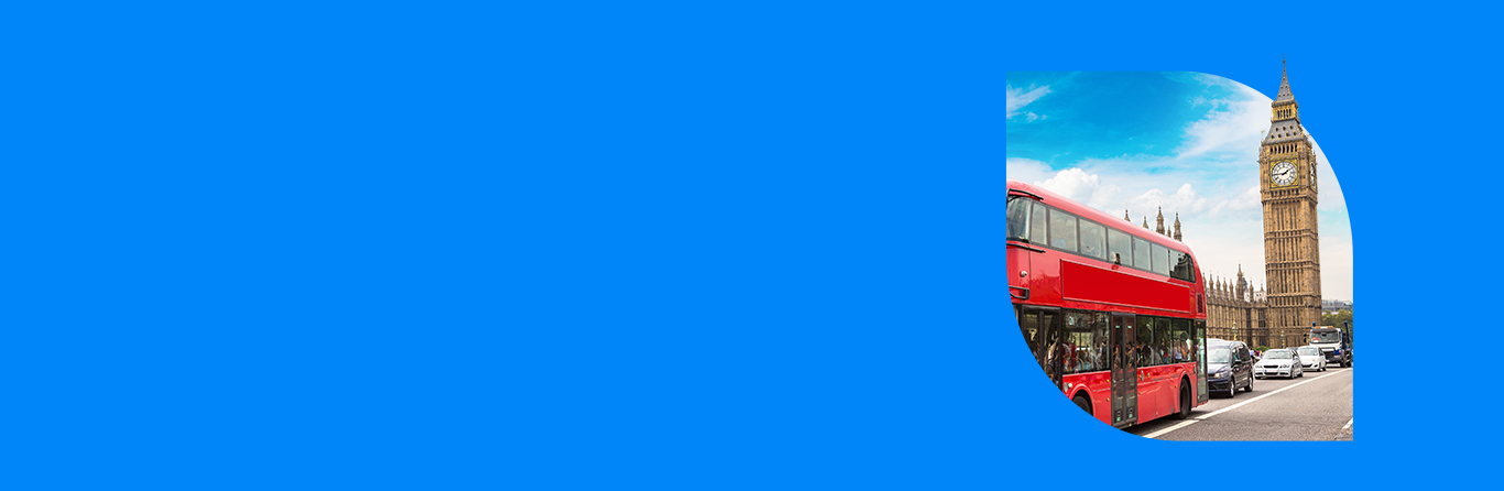 A partial image shows a red double-decker bus and cars on a street near Big Ben in London, with a clear blue sky above. The rest of the image is a solid blue background.