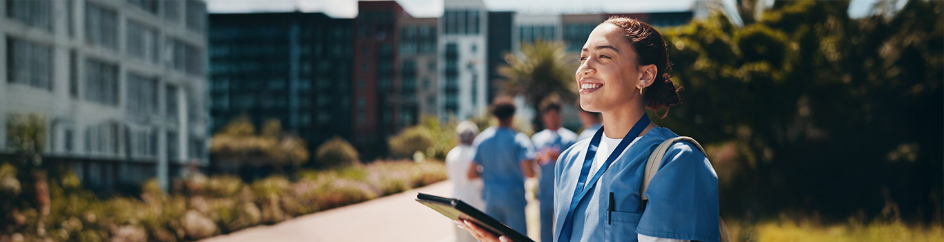 A happy person on a med school campus
