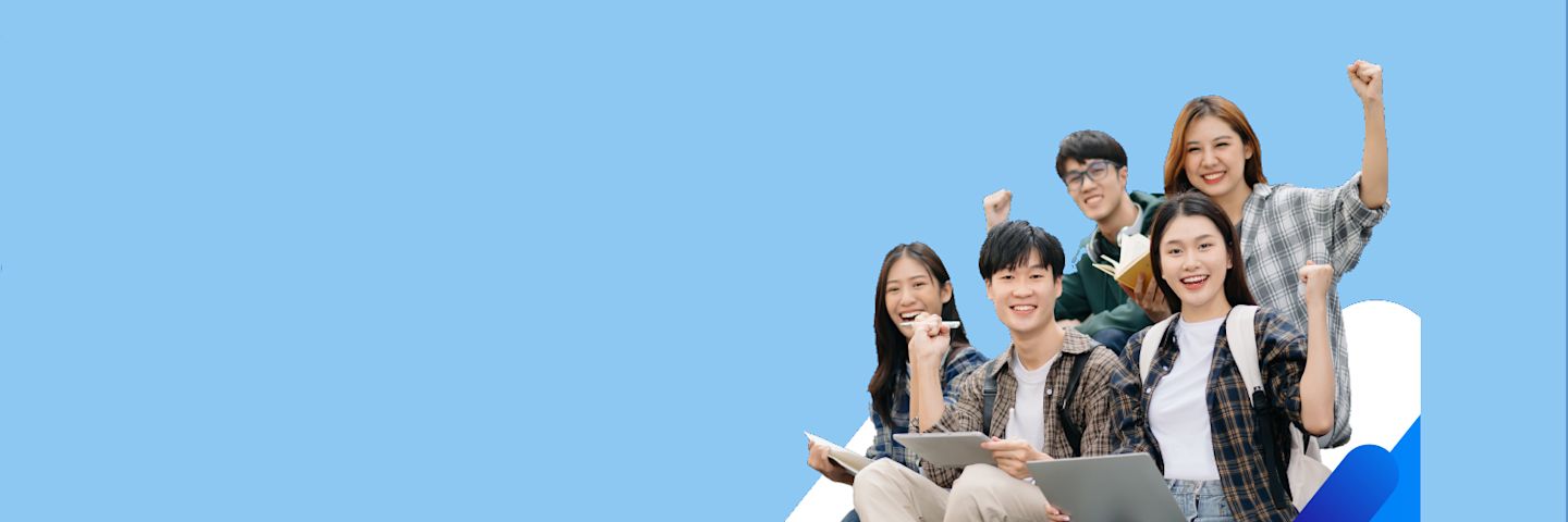 A vibrant event space filled with attendees, booths showcasing technology, and engaging displays under warm lighting