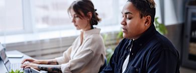 Three students talking to each other