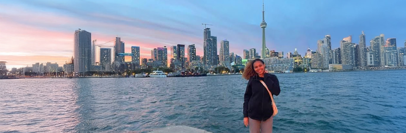 Ariana Markle against the Toronto skyline from the Toronto Island