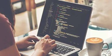 A computer student working with coding