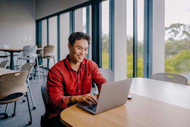 a person type on laptop