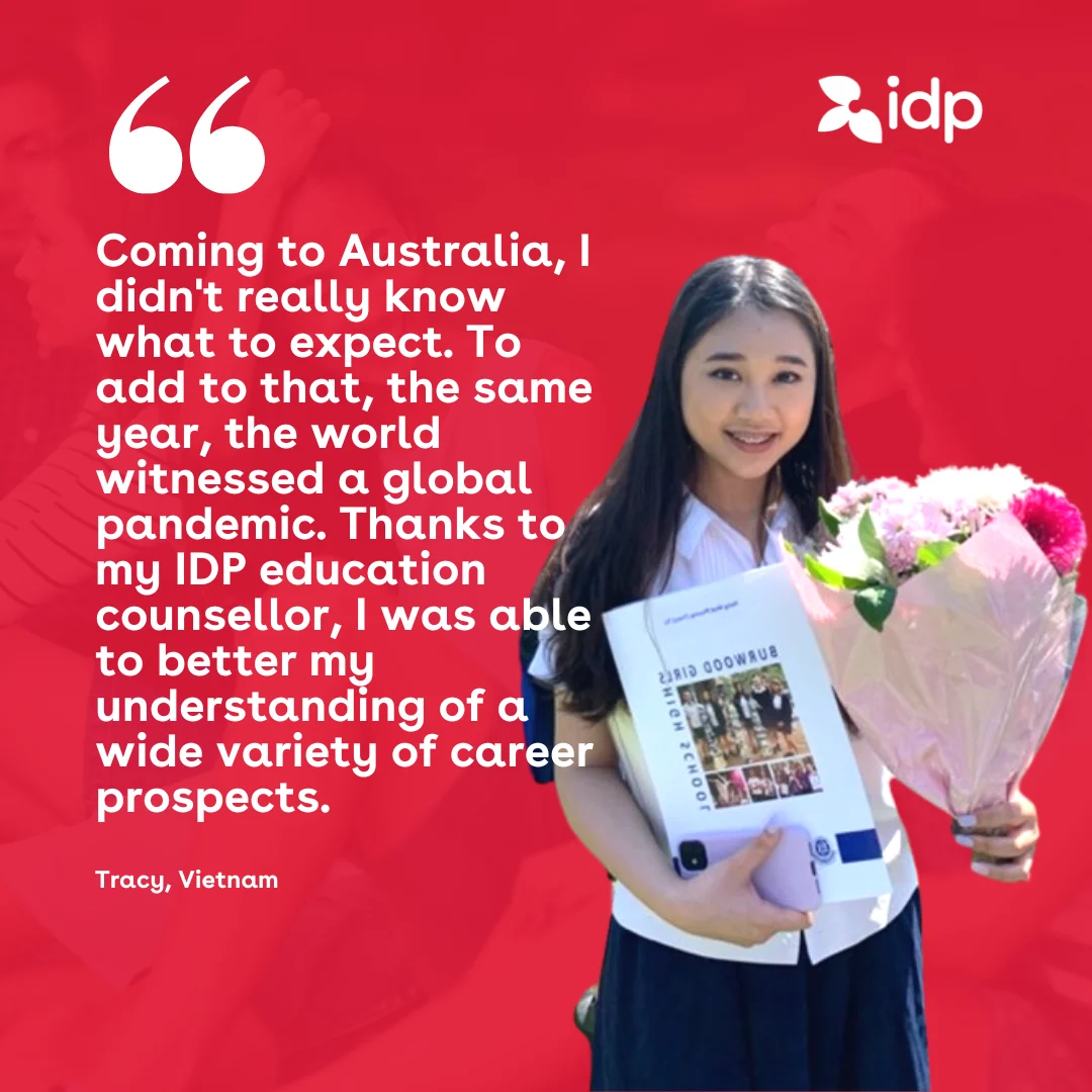 A young woman holding a bouquet and a booklet stands smiling against a red background with the IDP logo. A testimonial quote describes her positive experience with IDP education in Australia during the pandemic.