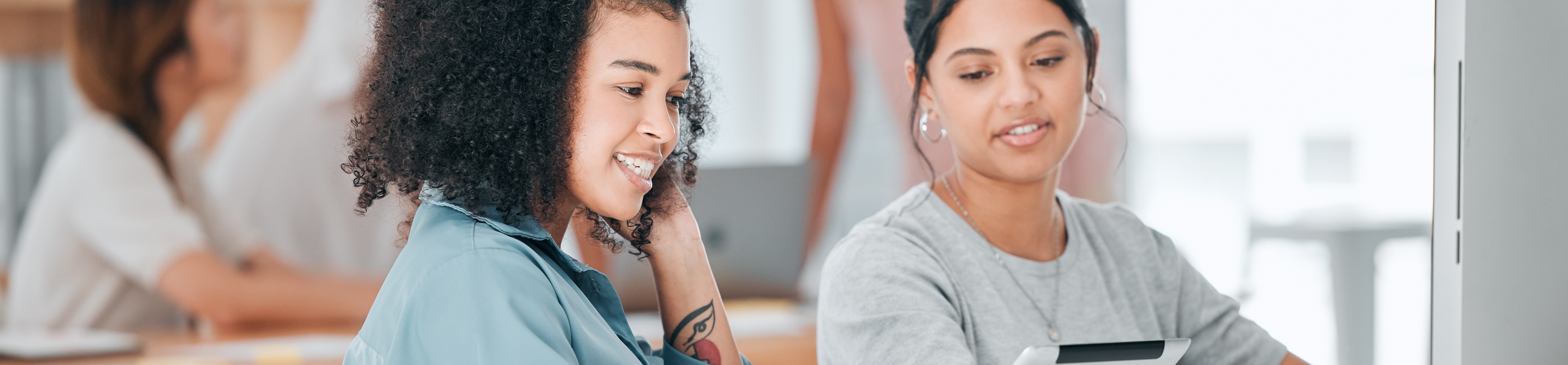 women watching IELTS webinar