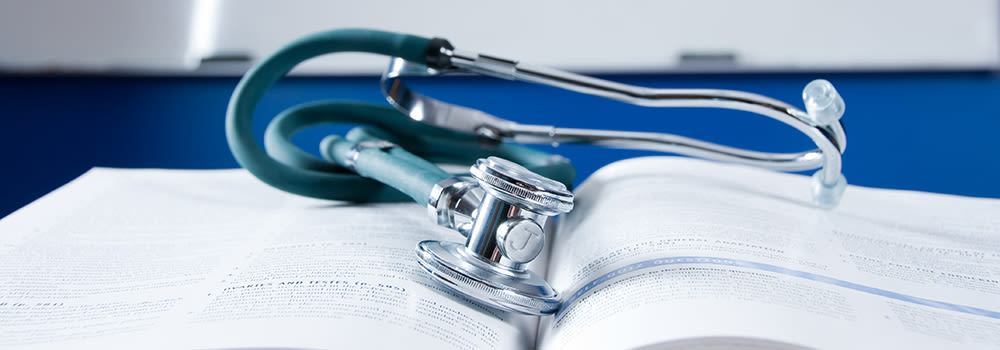 Stethoscope on a book