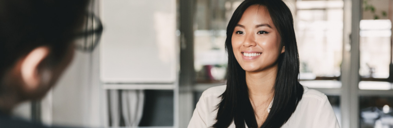 a test taker talking to IELTS officer