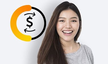 A female student wearing a grey t-shirt smiling happily