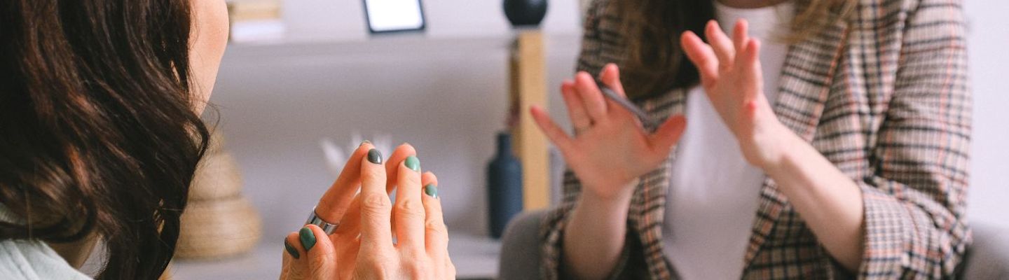 A therapist listening to a patient