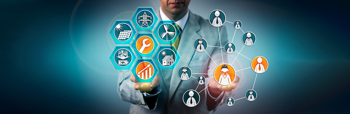 Business professional displaying renewable energy icons and connected network of people icons against blue background