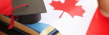 A Graduation hat and Canada flag symbol.